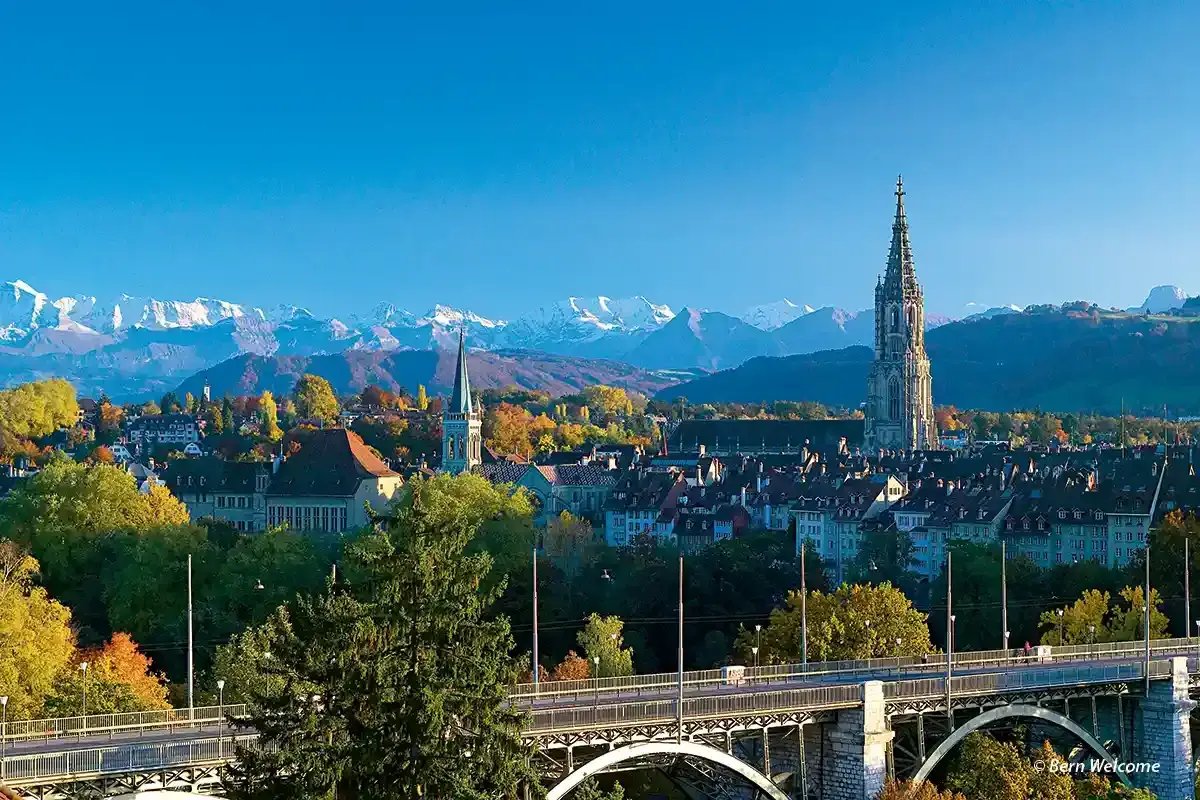 Bern Cathedral  with the Berner Oberland snowy mountains in the backdrop