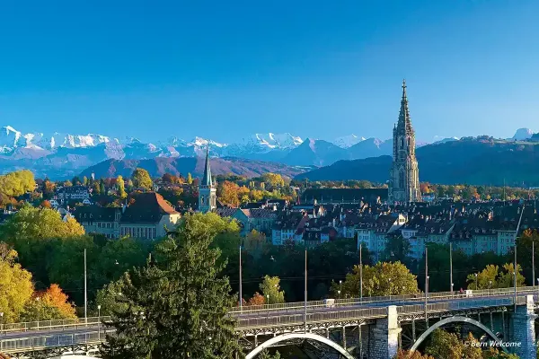 Bern Cathedral  with the Berner Oberland snowy mountains in the backdrop
